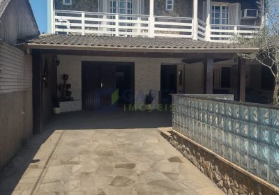 Casa com 240m², 3 dormitórios, 1 suíte, 5 vagas no bairro Santo Agostinho em Porto Alegre