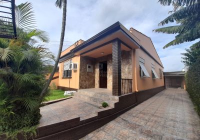 Casa com 134m², 2 dormitórios, 3 vagas no bairro Sarandi em Porto Alegre
