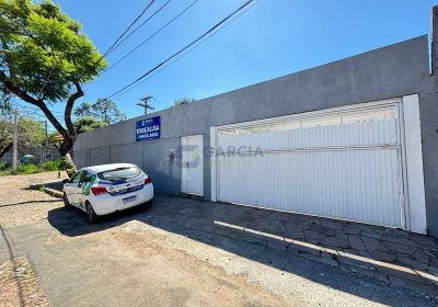 Casa com 350m², 7 dormitórios, 1 suíte, 4 vagas no bairro Sarandi em Porto Alegre