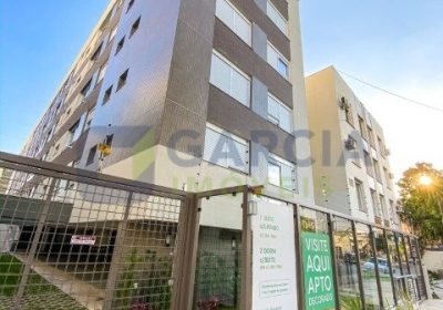 Apartamento com 61m², 2 dormitórios, 1 suíte, 2 vagas no bairro Menino Deus em Porto Alegre