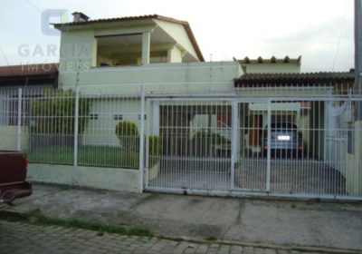 Casa com 300m², 3 dormitórios, 2 suítes, 6 vagas no bairro Sarandi em Porto Alegre