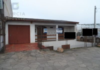 Casa com 300m², 3 dormitórios, 1 suíte, 2 vagas no bairro São Sebastião em Porto Alegre