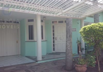 Casa com 110m², 3 dormitórios, 1 suíte, 3 vagas no bairro Sarandi em Porto Alegre