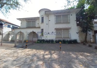 Casa com 441m², 10 dormitórios, 10 vagas no bairro Moinhos de Vento em Porto Alegre