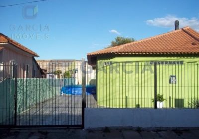 Casa com 78m², 2 dormitórios, 3 vagas no bairro Sarandi em Porto Alegre