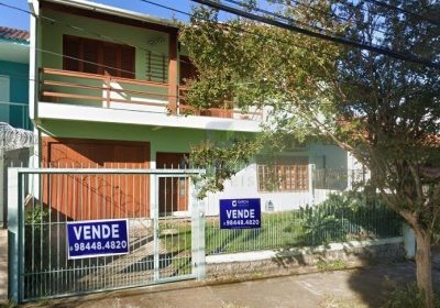Casa com 265m², 4 dormitórios, 1 suíte, 2 vagas no bairro Sarandi em Porto Alegre