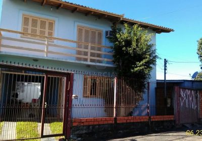Casa com 160m², 3 dormitórios, 1 suíte, 2 vagas no bairro Sarandi em Porto Alegre
