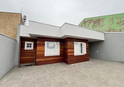 Casa com 130m², 3 dormitórios, 1 suíte, 2 vagas no bairro Costa e Silva em Porto Alegre