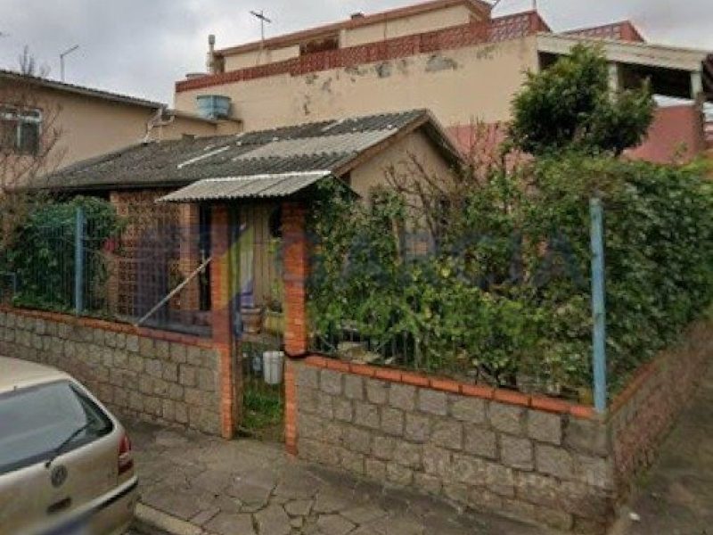 Casa com 100m², 3 dormitórios, 1 suíte, 2 vagas no bairro Costa e Silva em Porto Alegre