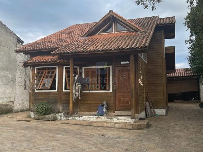 Casa com 300m², 3 dormitórios, 1 suíte, 3 vagas no bairro Jardim Itu Sabará em Porto Alegre