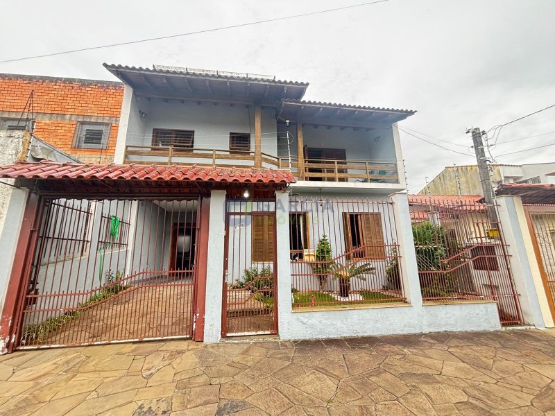 Casa com 390m², 5 dormitórios, 1 suíte, 4 vagas no bairro Sarandi em Porto Alegre