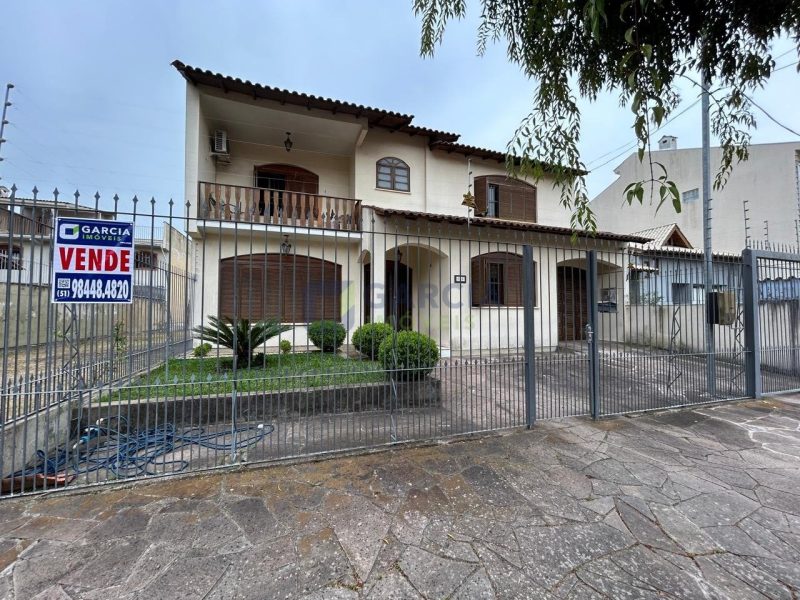 Casa com 293m², 4 dormitórios, 1 suíte, 4 vagas no bairro Jardim Itu em Porto Alegre