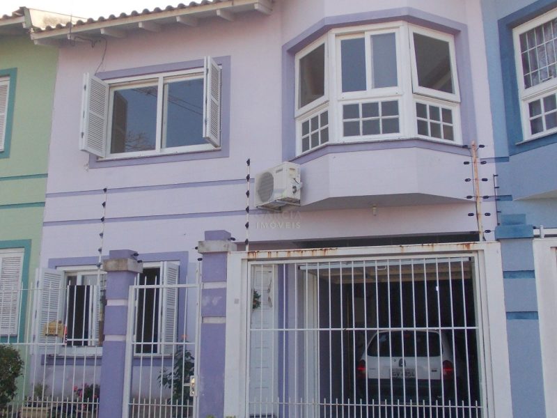 Casa com 148m², 3 dormitórios, 1 suíte, 2 vagas no bairro Santa Fe em Porto Alegre