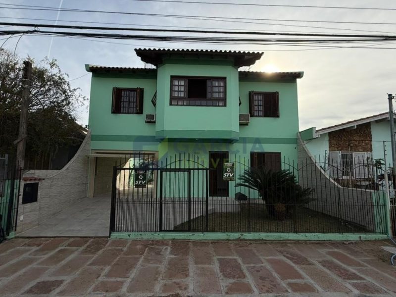 Casa com 189m², 2 dormitórios, 2 suítes, 5 vagas no bairro Sarandi em Porto Alegre