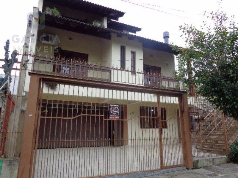 Casa com 266m², 3 dormitórios, 1 suíte, 6 vagas no bairro Parque Santa Fé em Porto Alegre