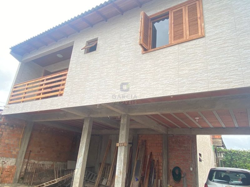 Casa com 300m², 4 dormitórios, 1 suíte, 2 vagas no bairro Sarandi em Porto Alegre