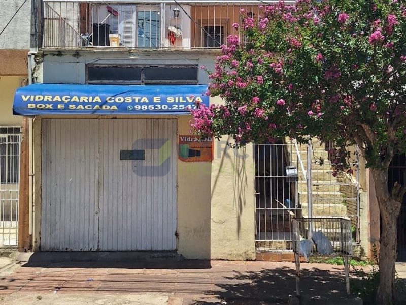 Casa com 135m², 5 dormitórios, 1 vaga no bairro Costa e Silva em Porto Alegre