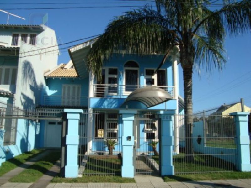 Casa com 319m², 3 dormitórios, 2 suítes, 3 vagas no bairro Santa Fé em Porto Alegre